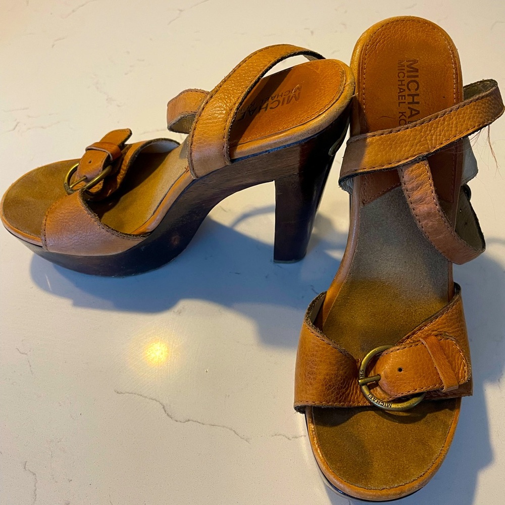 Michael Kors wooden block heels with leather straps.